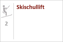 Logo des Lärchenhof-Resorts. Der Skilift liegt direkt am Hotel. • © Der Lärchenhof